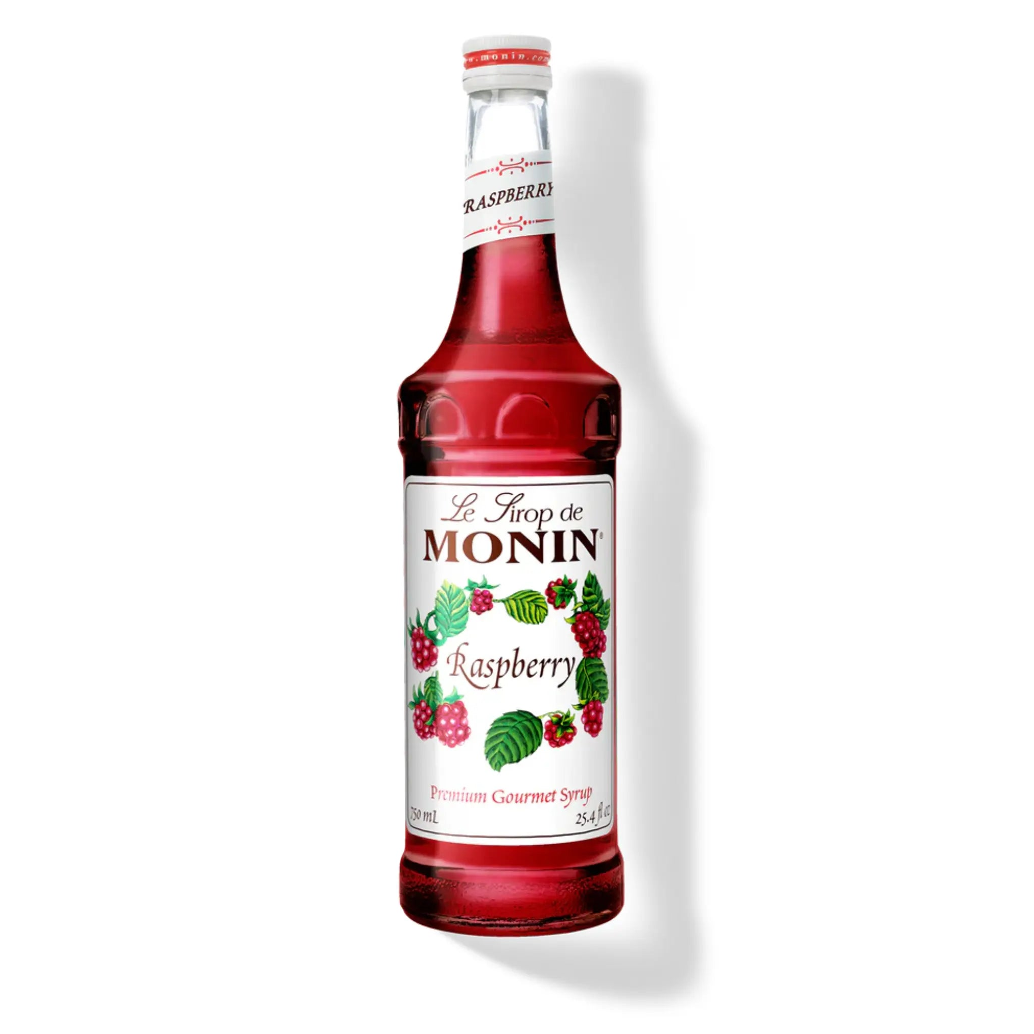 Bouteille de sirop de framboise Monin 750 ml avec étiquette rouge et fruits rouges éclatants