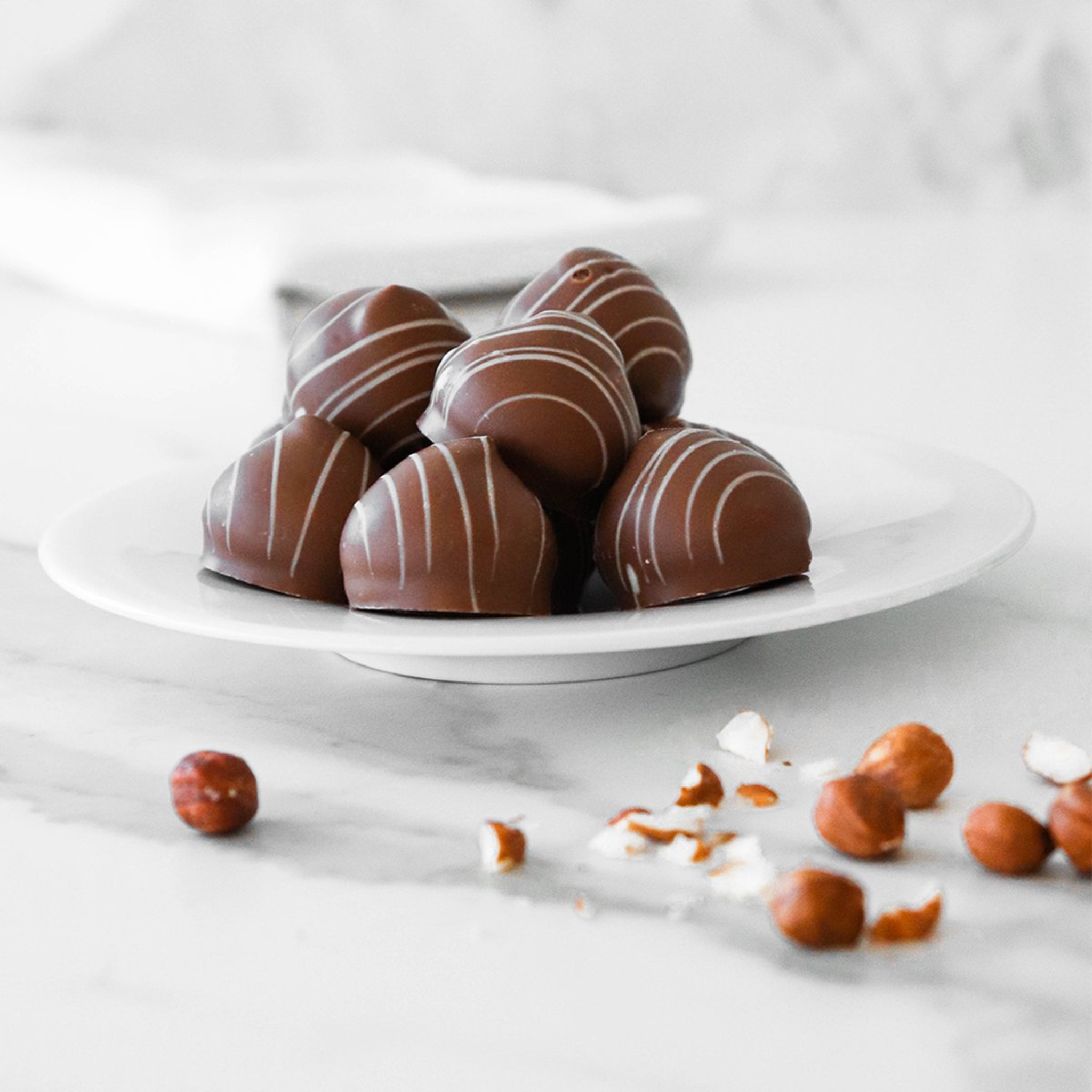 Guimauve à la noisette enrobée de chocolat au lait 155 g - Petit Melo