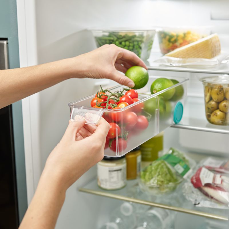 Contenant à deux compartiments pour réfrigérateur