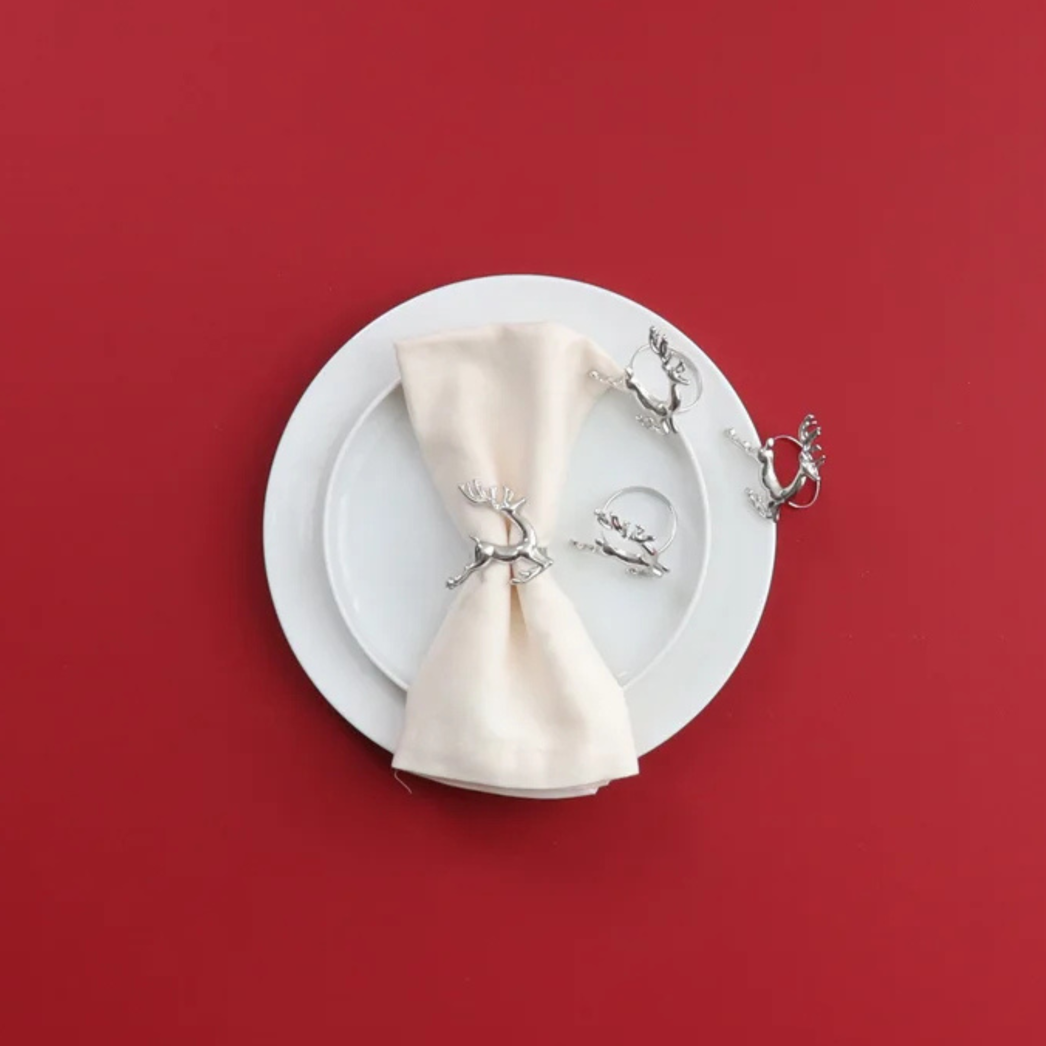 Ensemble de 4 anneaux de serviette en forme de renne argenté