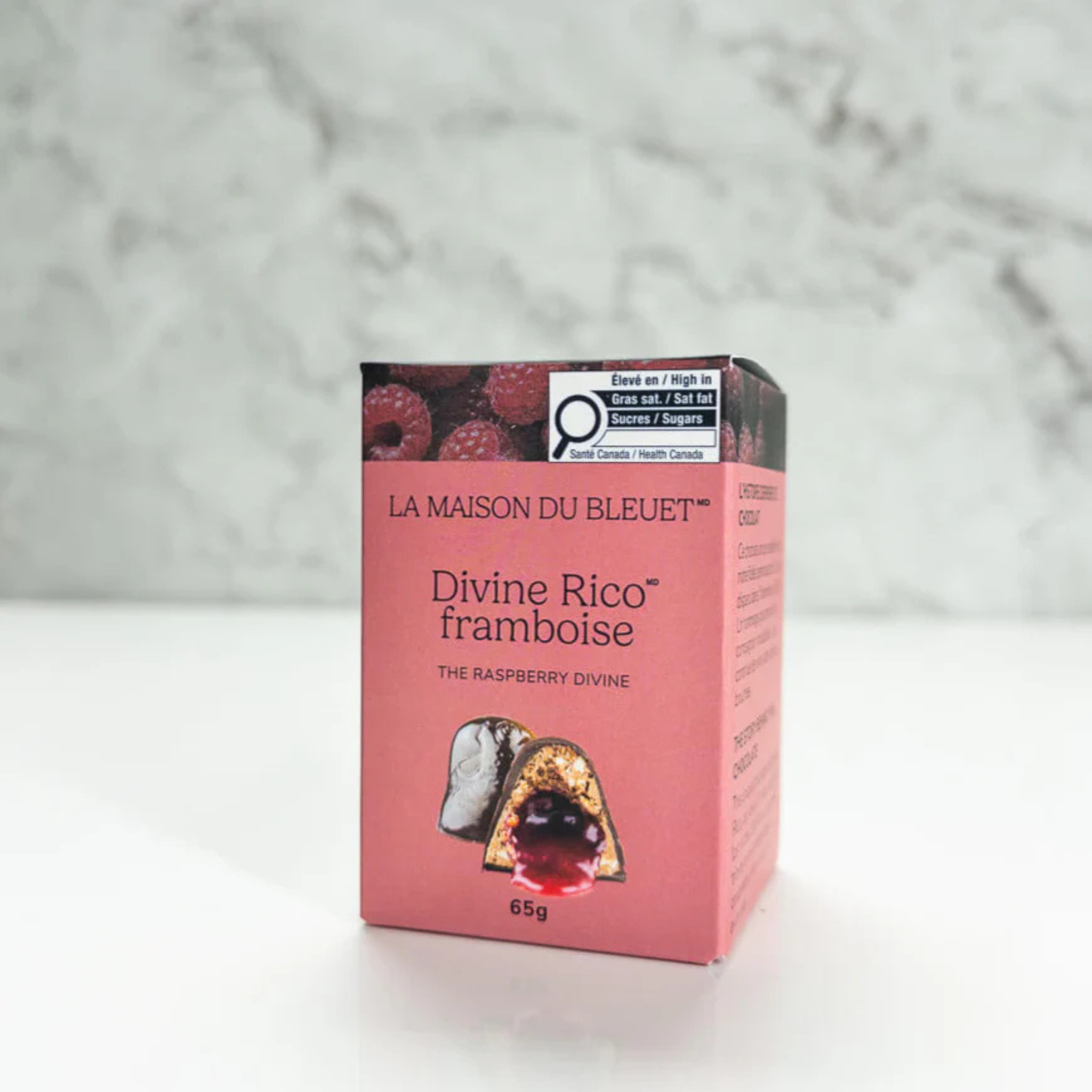Chocolat Divine aux framboises 65 g La Maison du Bleuet chocolat au lait praliné noisette ganache framboise
