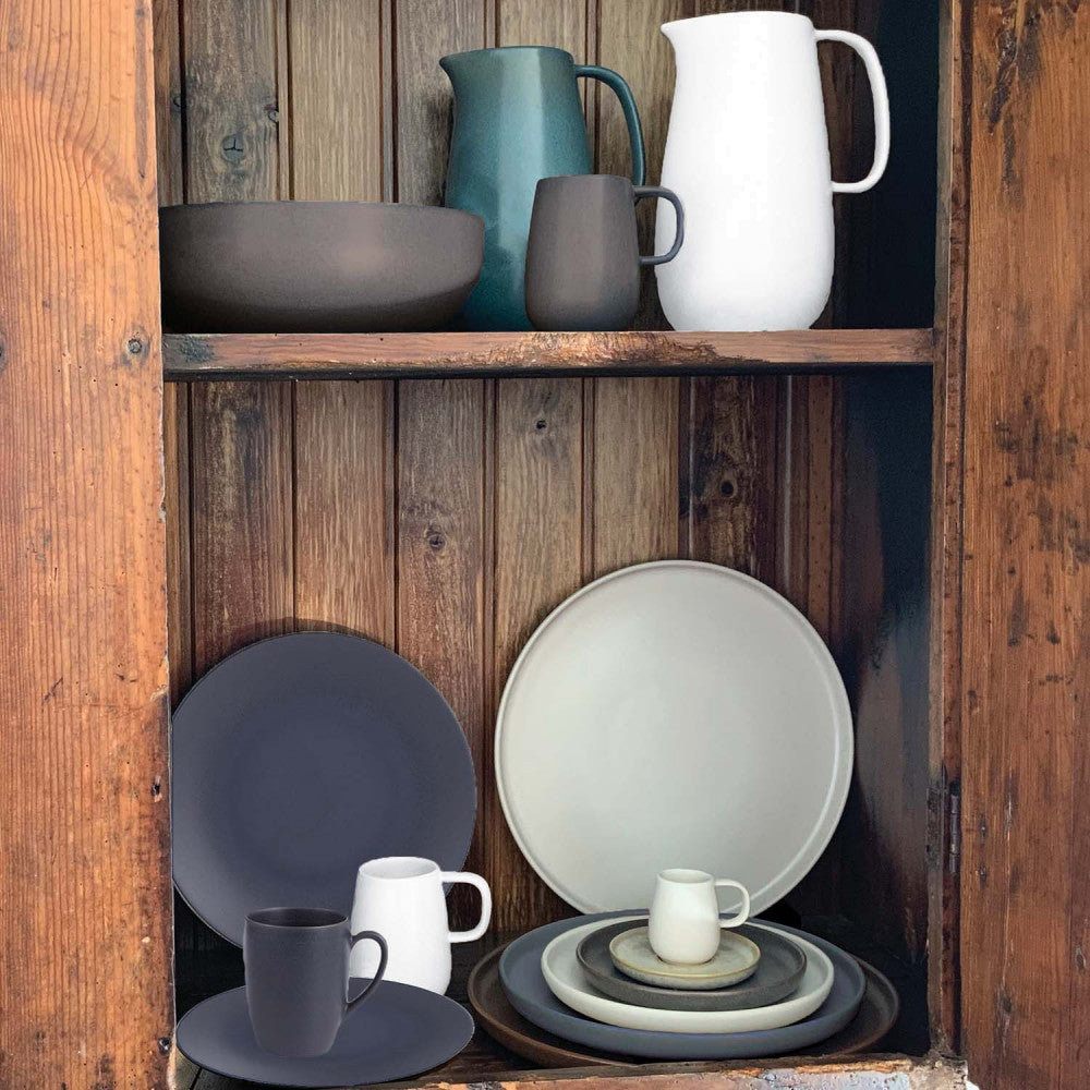 Glossy white stoneware pitcher